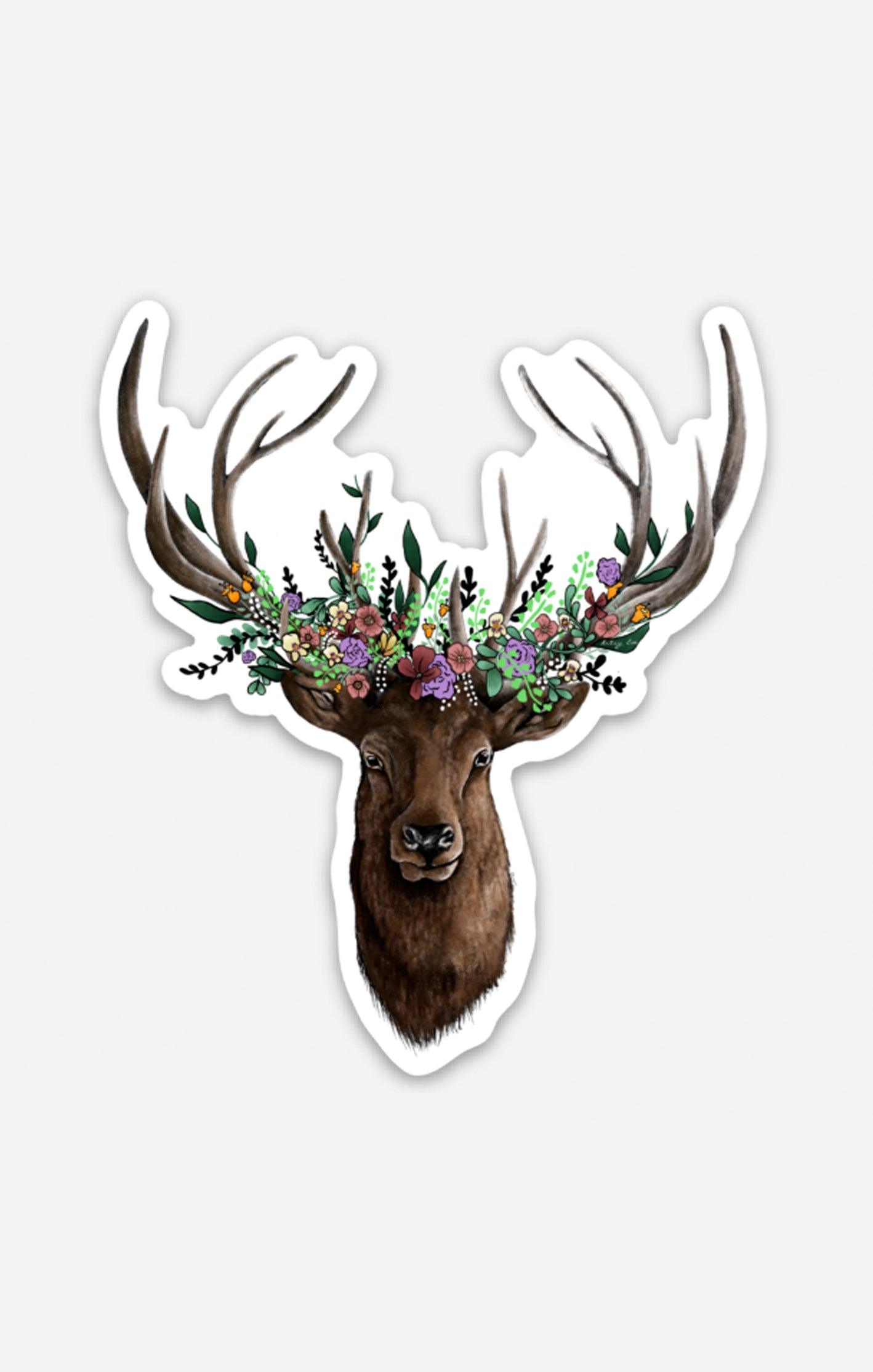 Hand-drawn elk sticker featuring realistic antlers adorned with a colorful floral crown in shades of purple, pink, orange, and green, designed by Artsy Em’s Designs.